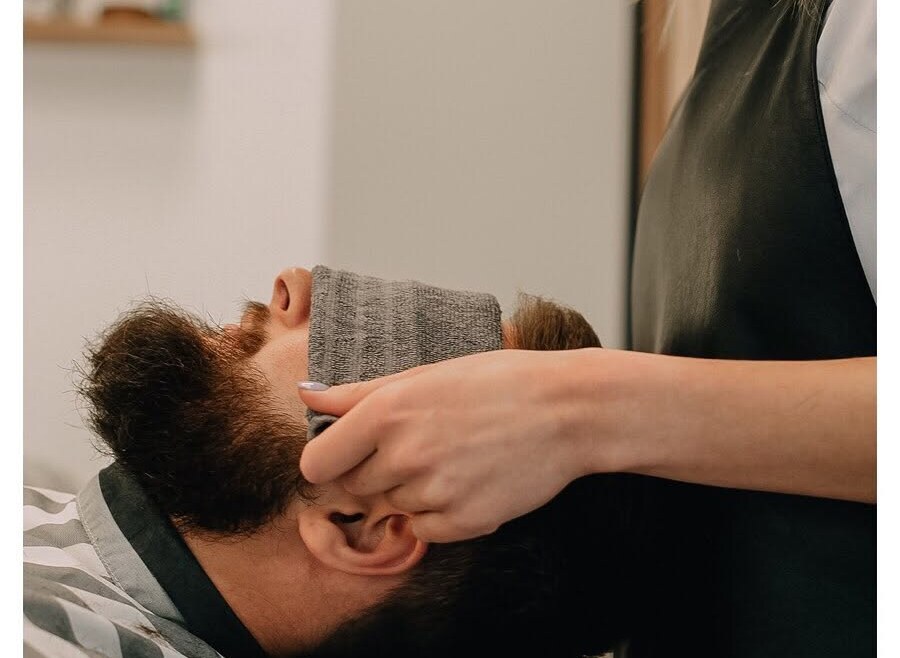 Close-up of a barber at work